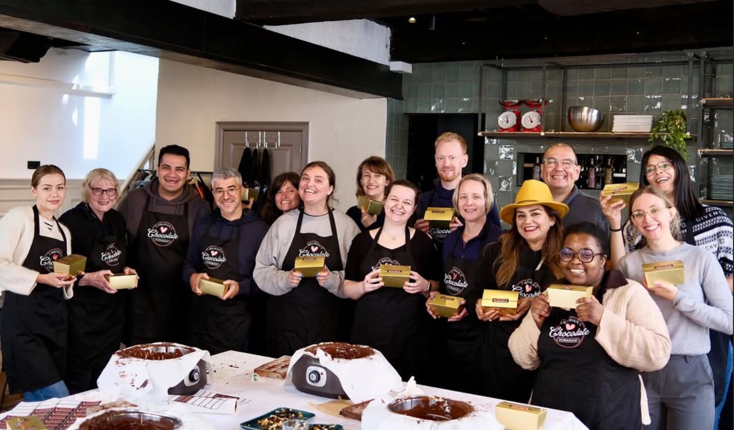 group of people taking a private chocolate making class in Brussels and Bruges in Belgium
