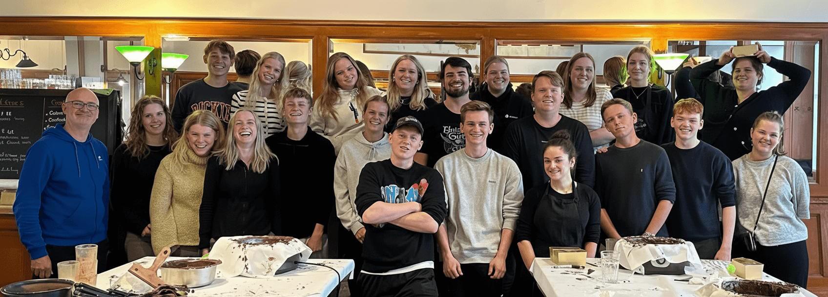 group of people happy after a chocolate making workshop in brussels praline and mendiants